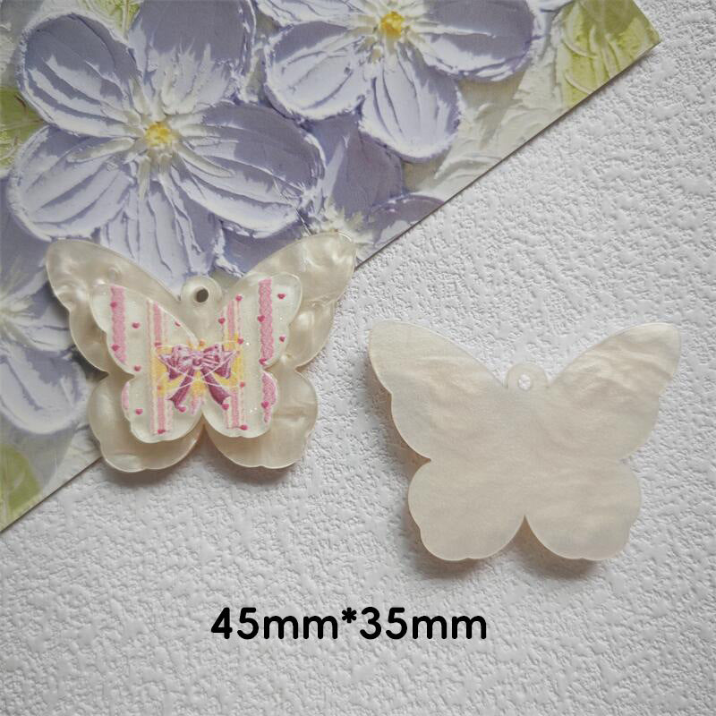Wholesale 10pcs Water Pattern Double Butterfly Cute Cartoon Hole Pendant Embossed Printing Design Acrylic Jewelry Accessories DIY